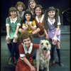 Actress Andrea McArdle as Annie w. Sandy, Danielle Brisebois and orphans in a scene from the Broadway production of the musical "Annie."