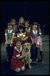 Actress Andrea McArdle as Annie w. Sandy, Danielle Brisebois and orphans in a scene from the Broadway production of the musical "Annie."