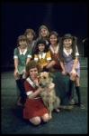 Actress Andrea McArdle as Annie w. Sandy, Danielle Brisebois and orphans in a scene from the Broadway production of the musical "Annie."