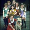 Actress Andrea McArdle as Annie w. Sandy, Danielle Brisebois and orphans in a scene from the Broadway production of the musical "Annie."