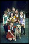 Actress Andrea McArdle as Annie w. Sandy, Danielle Brisebois and orphans in a scene from the Broadway production of the musical "Annie."
