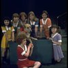 Actress Andrea McArdle as Annie w. Sandy, Danielle Brisebois and orphans in a scene from the Broadway production of the musical "Annie."