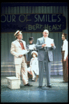 Actors Reid Shelton as Daddy Warbucks (2L) and Andrea McArdle as Annie (3L) in a scene from the Broadway production of the musical "Annie."