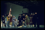 Actress Andrea McArdle as Annie w. Sandy and Hooverville-ites in a scene from the Broadway production of the musical "Annie."