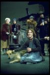 Actress Andrea McArdle as Annie w. Sandy and Hooverville-ites in a scene from the Broadway production of the musical "Annie."