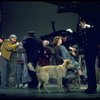 Actress Andrea McArdle as Annie w. Sandy and Hooverville-ites in a scene from the Broadway production of the musical "Annie."