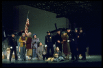 Actress Andrea McArdle as Annie w. Sandy and Hooverville-ites in a scene from the Broadway production of the musical "Annie."