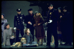 Actress Andrea McArdle as Annie w. Sandy and Hooverville-ites in a scene from the Broadway production of the musical "Annie."