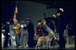 Actress Andrea McArdle as Annie w. Sandy and Hooverville-ites in a scene from the Broadway production of the musical "Annie."