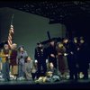 Actress Andrea McArdle as Annie w. Sandy and Hooverville-ites in a scene from the Broadway production of the musical "Annie."