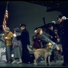 Actress Andrea McArdle as Annie w. Sandy and Hooverville-ites in a scene from the Broadway production of the musical "Annie."