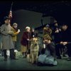 Actress Andrea McArdle as Annie w. Sandy and Hooverville-ites in a scene from the Broadway production of the musical "Annie."