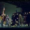 Actress Andrea McArdle as Annie w. Sandy and Hooverville-ites in a scene from the Broadway production of the musical "Annie."