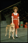 Actress Andrea McArdle as Annie w. Sandy in a scene from the Broadway production of the musical "Annie."