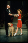 Actors Andrea McArdle as Annie and Reid Shelton as Daddy Warbucks w. Sandy in a scene from the Broadway production of the musical "Annie."