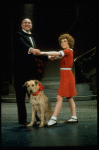 Actors Andrea McArdle as Annie and Reid Shelton as Daddy Warbucks w. Sandy in a scene from the Broadway production of the musical "Annie."