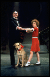 Actors Andrea McArdle as Annie and Reid Shelton as Daddy Warbucks w. Sandy in a scene from the Broadway production of the musical "Annie."