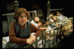 Actress Andrea McArdle as Annie (L) w. Danielle Brisebois (3L) and orphans in a scene from the Broadway production of the musical "Annie."
