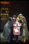 Shelley Bruce as Annie, Reid Shelton as Daddy Warbucks and Sandy Faison as Grace in a scene from the Broadway production of the musical "Annie."