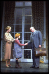 Shelley Bruce as Annie, Reid Shelton as Daddy Warbucks and Sandy Faison as Grace in a scene from the Broadway production of the musical "Annie."