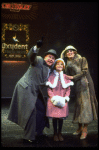 Shelley Bruce as Annie, Reid Shelton as Daddy Warbucks and Sandy Faison as Grace in a scene from the Broadway production of the musical "Annie."