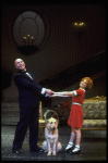 Actors Shelley Bruce as Annie and Reid Shelton as Daddy Warbucks w. Sandy in a scene from the Broadway production of the musical "Annie."