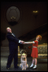 Actors Shelley Bruce as Annie and Reid Shelton as Daddy Warbucks w. Sandy in a scene from the Broadway production of the musical "Annie."