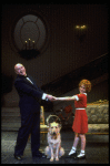 Actors Shelley Bruce as Annie and Reid Shelton as Daddy Warbucks w. Sandy in a scene from the Broadway production of the musical "Annie."