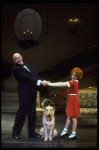 Actors Shelley Bruce as Annie and Reid Shelton as Daddy Warbucks w. Sandy in a scene from the Broadway production of the musical "Annie."