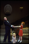 Actors Shelley Bruce as Annie and Reid Shelton as Daddy Warbucks w. Sandy in a scene from the Broadway production of the musical "Annie."