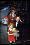 Shelley Bruce as Annie, Reid Shelton as Daddy Warbucks and Dorothy Loudon as Miss Hannigan w. Sandy in a scene from the Broadway production of the musical "Annie."