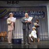 Actors Reid Shelton as Daddy Warbucks (2R) and Shelley Bruce as Annie (2L) in a scene from the Broadway production of the musical "Annie."