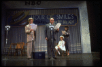 Actors Reid Shelton as Daddy Warbucks (2R) and Shelley Bruce as Annie (2L) in a scene from the Broadway production of the musical "Annie."