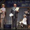 Actors Reid Shelton as Daddy Warbucks (2R) and Shelley Bruce as Annie (2L) in a scene from the Broadway production of the musical "Annie."