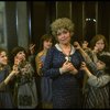 Actress Dorothy Loudon as Miss Hannigan (C) surrounded by orphans incl. Danielle Brisebois (2L) in a scene from the Broadway production of the musical "Annie."