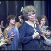 Actress Dorothy Loudon as Miss Hannigan (C) surrounded by orphans incl. Danielle Brisebois (2L) in a scene from the Broadway production of the musical "Annie."