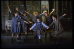 Actress Sarah Jessica Parker (L) w. orphans in a scene from the Broadway production of the musical "Annie."