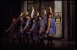 Actress Sarah Jessica Parker (2L) w. orphans in a scene from the Broadway production of the musical "Annie."