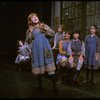 Actress Sarah Jessica Parker (R) w. orphans in a scene from the Broadway production of the musical "Annie."