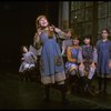 Actress Sarah Jessica Parker (R) w. orphans in a scene from the Broadway production of the musical "Annie."