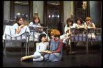 Actresses Shelley Bruce as Annie (C) and Sarah Jessica Parker (R) w. orphans in a scene from the Broadway production of the musical "Annie."