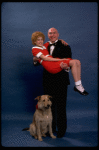 Sarah Jessica Parker as Annie and Reid Shelton as Daddy Warbucks w. Sandy in a scene from the Broadway production of the musical "Annie."