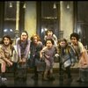 Sarah Jessica Parker as Annie w. orphans in a scene from the Broadway production of the musical "Annie."