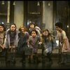 Sarah Jessica Parker as Annie w. orphans in a scene from the Broadway production of the musical "Annie."