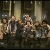 Sarah Jessica Parker as Annie w. orphans in a scene from the Broadway production of the musical "Annie."