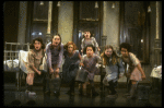 Sarah Jessica Parker as Annie w. orphans in a scene from the Broadway production of the musical "Annie."