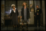 Sarah Jessica Parker as Annie and Alice Ghostley as Miss Hannigan w. a policeman in a scene from the Broadway production of the musical "Annie."