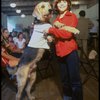 Roseanne Sorrentino as Annie and Harve Presnell as Daddy Warbucks w. Sandy during a rehearsal for the Dallas production of the musical "Annie."