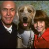 Roseanne Sorrentino as Annie and Harve Presnell as Daddy Warbucks w. Sandy during a rehearsal for the Dallas production of the musical "Annie."