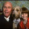 Roseanne Sorrentino as Annie and Harve Presnell as Daddy Warbucks w. Sandy during a rehearsal for the Dallas production of the musical "Annie."